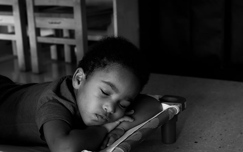 A child takes a nap